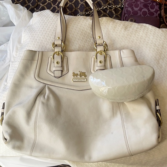 Coach Handbags - Coach ivory leather bag and Coach sunglass case used